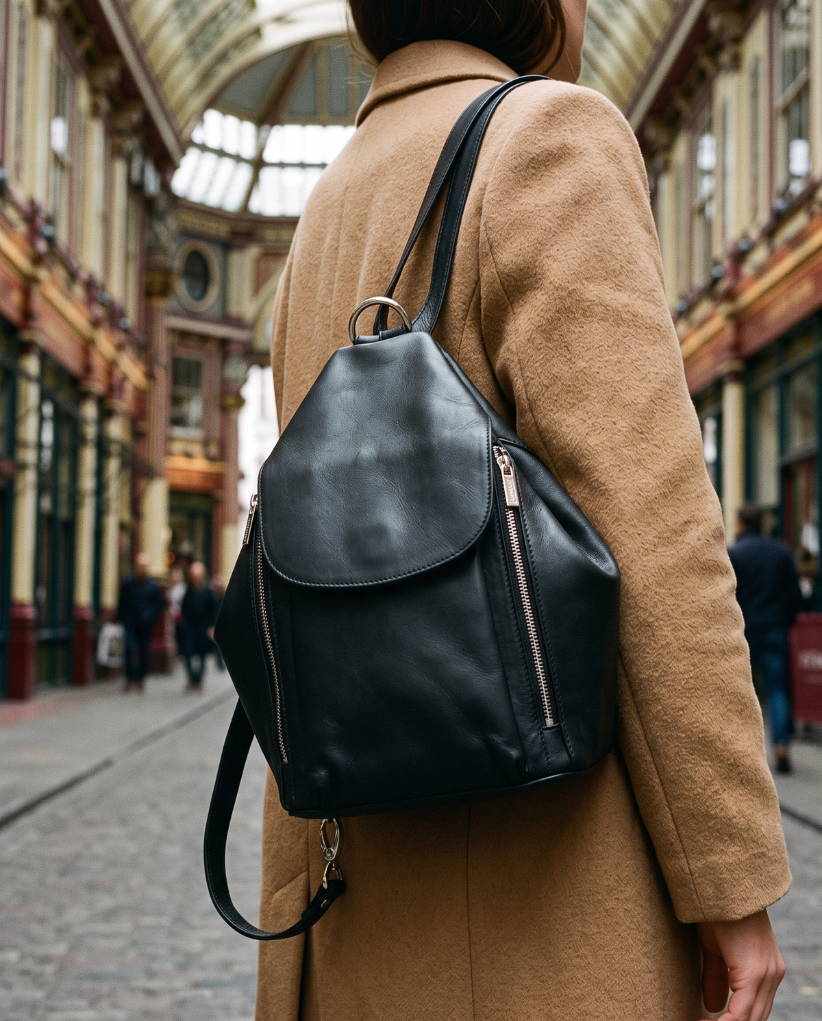Danii black backpack, carried by a model