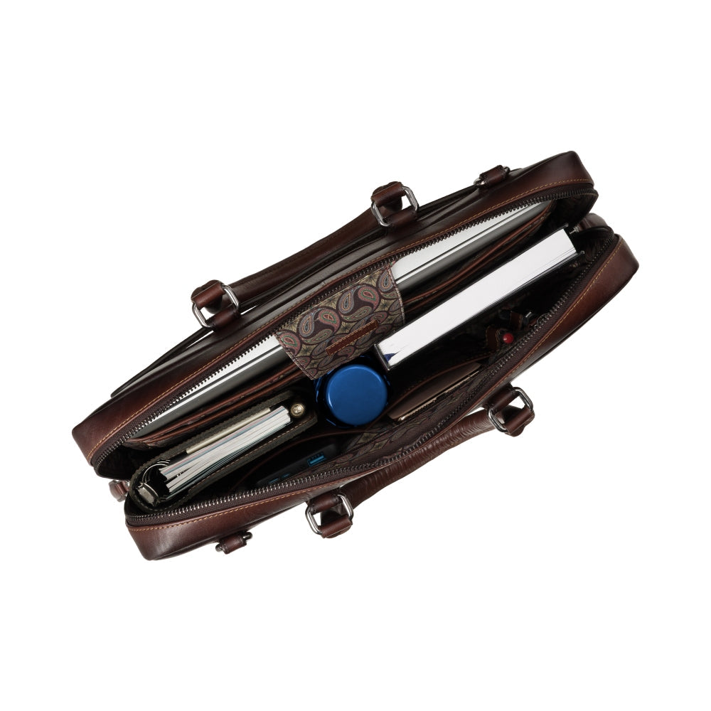 Carl burnished tan laptop bag, open from above, showing the padded interior