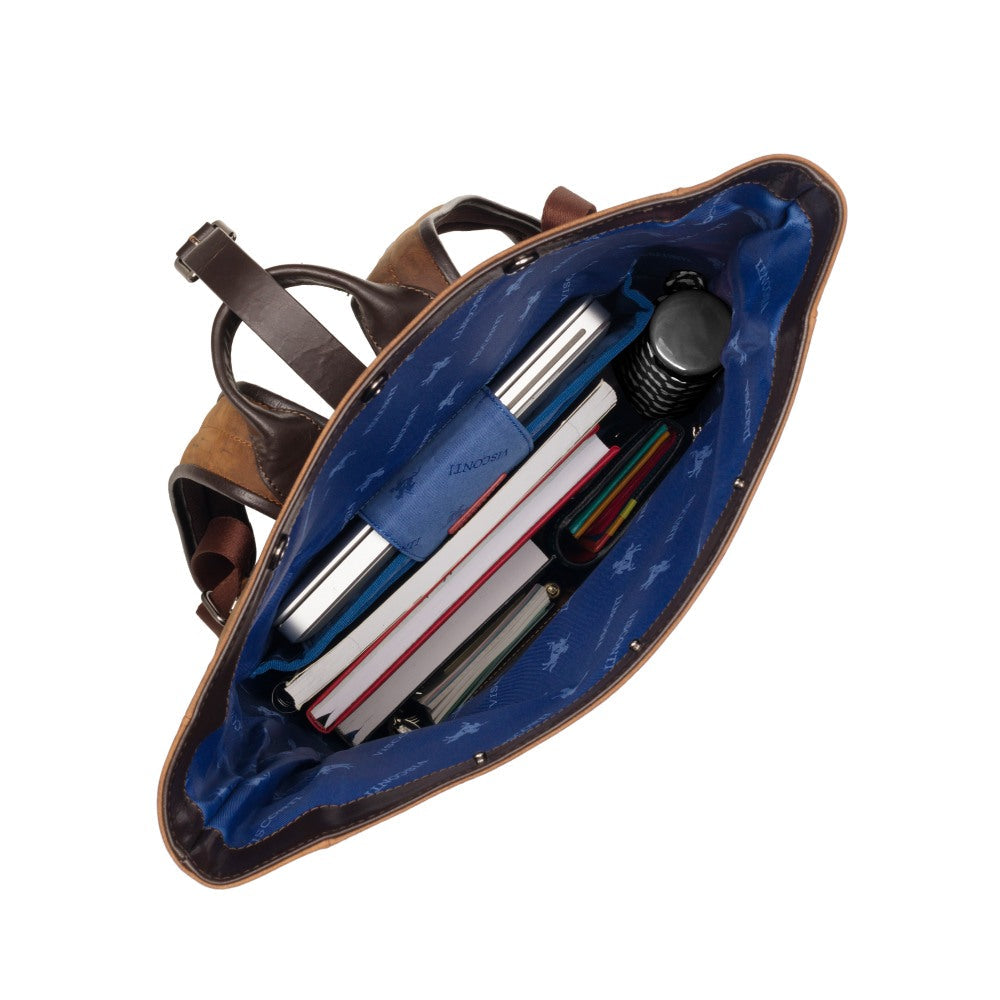 Transporter havana tan backpack, open from above, showing the lined interior