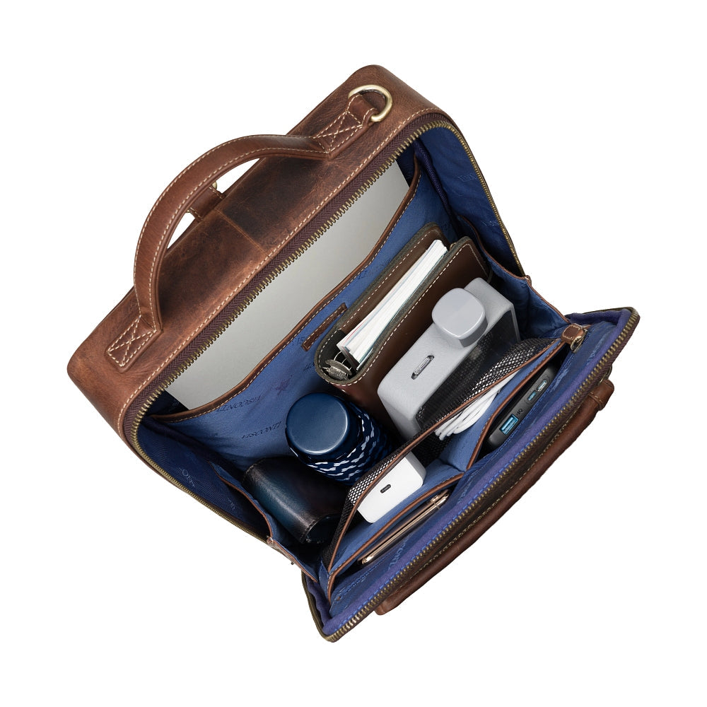 Skylar chestnut brown laptop bag, open, showing the padded sleeve and pockets