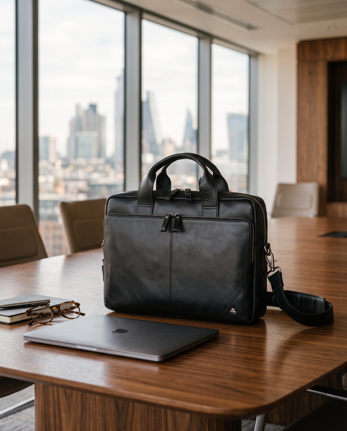 Hugo 15" black laptop bag, styled still life